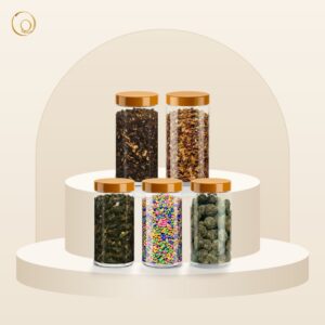 Home Mukhwas After-Meal Box: five mukhwas jars on an ivory podium