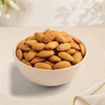 Almonds (Badam) in a white bowl