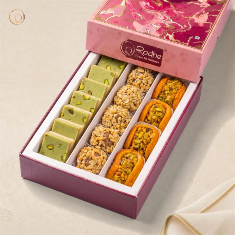 Pista Kesar Kaju Gift Box 500g Pista Kesar Kaju Gift Box 500g – Pistachio Exotica, Hazelnut Almond Bomb and Kaju Kesar Honey in a pink Radhe gift box