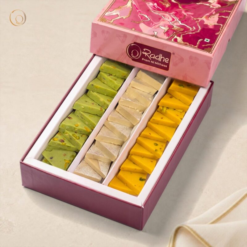 Assorted Katri Gift Box 500g Assorted Katri Gift Box 500g – silver-varakh Kaju Katri, Kesar Kaju Katri and pista-green Dry Fruit Katri in a pink Radhe gift box
