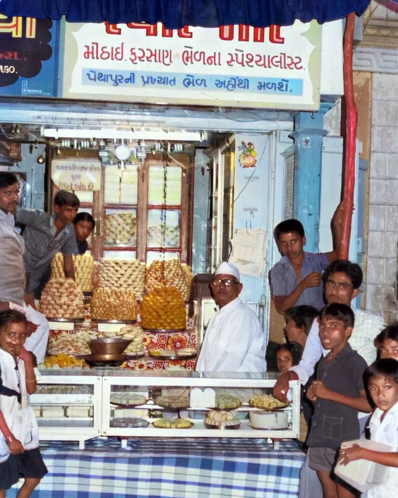 Our shop at Diwali in 1981, with sweets stacked on the counter