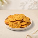 Chat Puri on a white plate – Radhe Prem Ni Mithaas